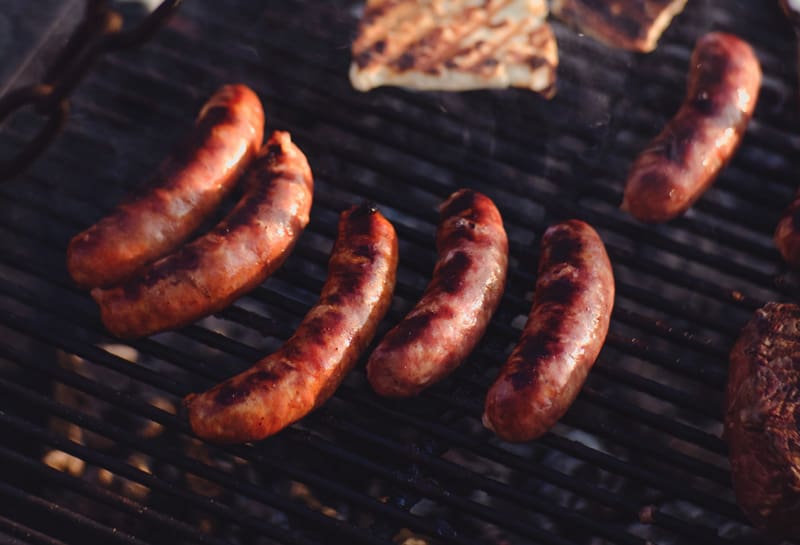 Amazing Venison Brats cooking on the grill